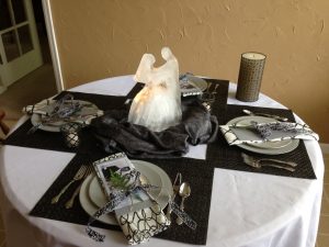 Elegant wedding centerpiece using bride and groom ice sculpture