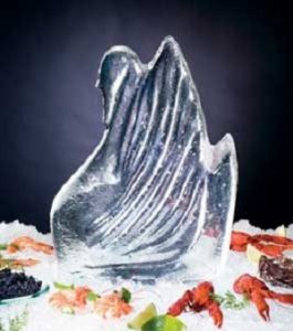Elegant swan ice sculpture centerpiece